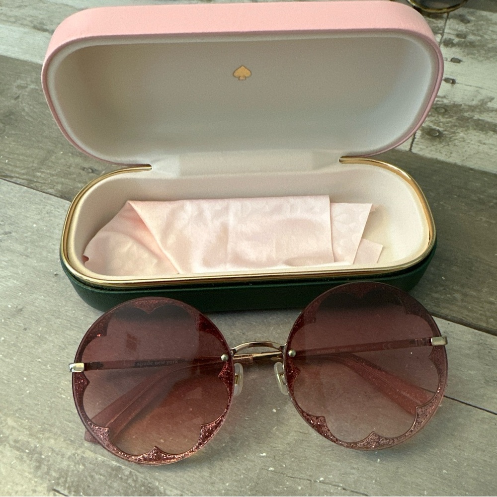 Pink Kate Spade Sunglasses with case. Like new condition (see pics).